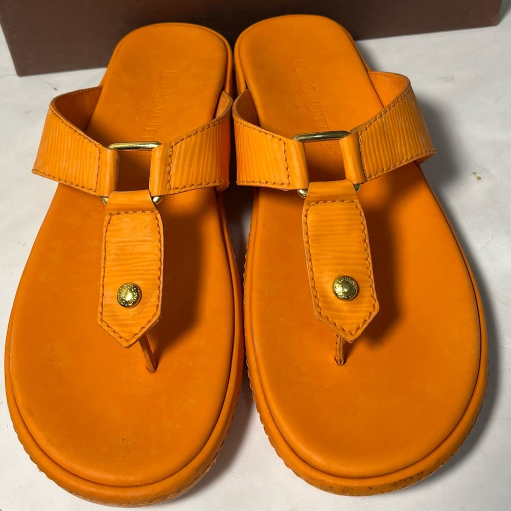Louis Vuitton Orange Flats with Gold Accents